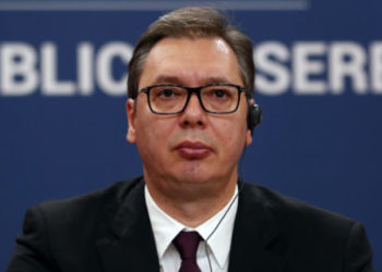 Serbian President Aleksandar Vucic listens Turkey's President Recep Tayyip Erdogan during a joint news conference in Belgrade, Serbia, Monday, Oct. 7, 2019. Turkish President Recep Tayyip Erdogan said Monday in Belgrade that Turkey will continue to play a "constructive role" in boosting stability in the Balkans where it maintains historic influence stemming from the centuries-long Ottoman rule. (AP Photo/Darko Vojinovic)
