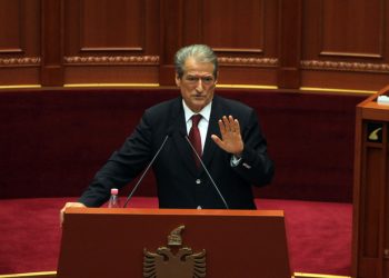 Former Albanian prime minister Sali Berisha speaks at Parliament in Tirana, Albania, Thursday April 21, 2016. Berisha, has called on Albanians to arm themselves because the government is failing to confront crime. Gun ownership is illegal in Albania and calls to break the law could result in a 10-year jail sentence. (AP Photo/Hektor Pustina)