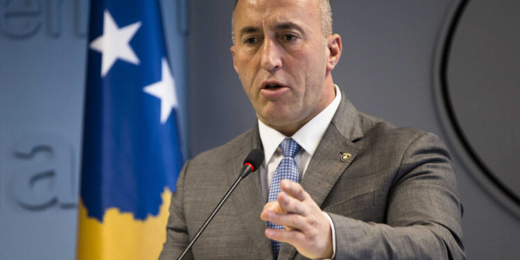Kosovo prime minister Ramush Haradinaj, speaks to the media during a press conference in Kosovo capital Pristina on Tuesday, Dec. 18, 2018. Haradinaj blamed Europe Union's foreign policy chief for "deviating the dialogue" on normalizing ties with Serbia. Haradinaj said that, while Serbia is taking major steps toward the integration with the bloc, his country's residents have remained "in a ghetto," not enjoying the visa-free travel to EU countries though it has fulfilled all requirements. (AP Photo/Visar Kryeziu)