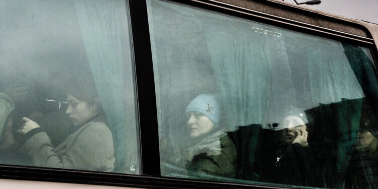 People on a bus leaving from the main bus station in Kyiv, Ukraine, Thursday, February 24th, 2022.

Photograph: Timothy Fadek / Redux