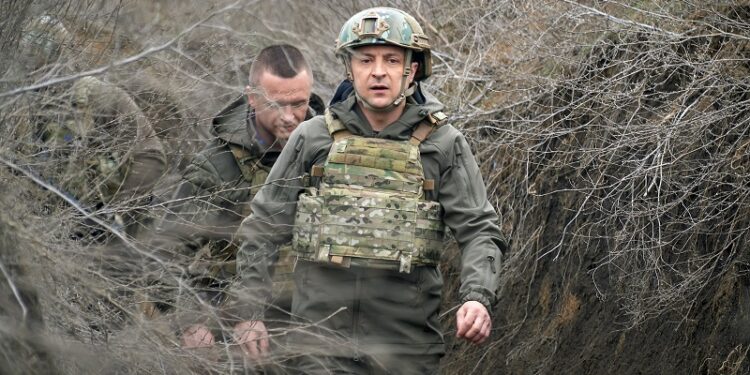 Ukraine's President Volodymyr Zelenskiy visits positions of armed forces near the frontline with Russian-backed separatists in Donbass region, Ukraine April 9, 2021. Ukrainian Presidential Press Service/Handout via REUTERS ATTENTION EDITORS - THIS IMAGE WAS PROVIDED BY A THIRD PARTY.
