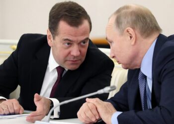 Russian President Vladimir Putin, right, listens to Prime Minister Dmitry Medvedev during the State Council meeting on the agricultural policy at the Kremlin in Moscow, Russia, Thursday, Dec. 26, 2019. (Yekaterina Shtukina, Sputnik, Government Pool Photo via AP)